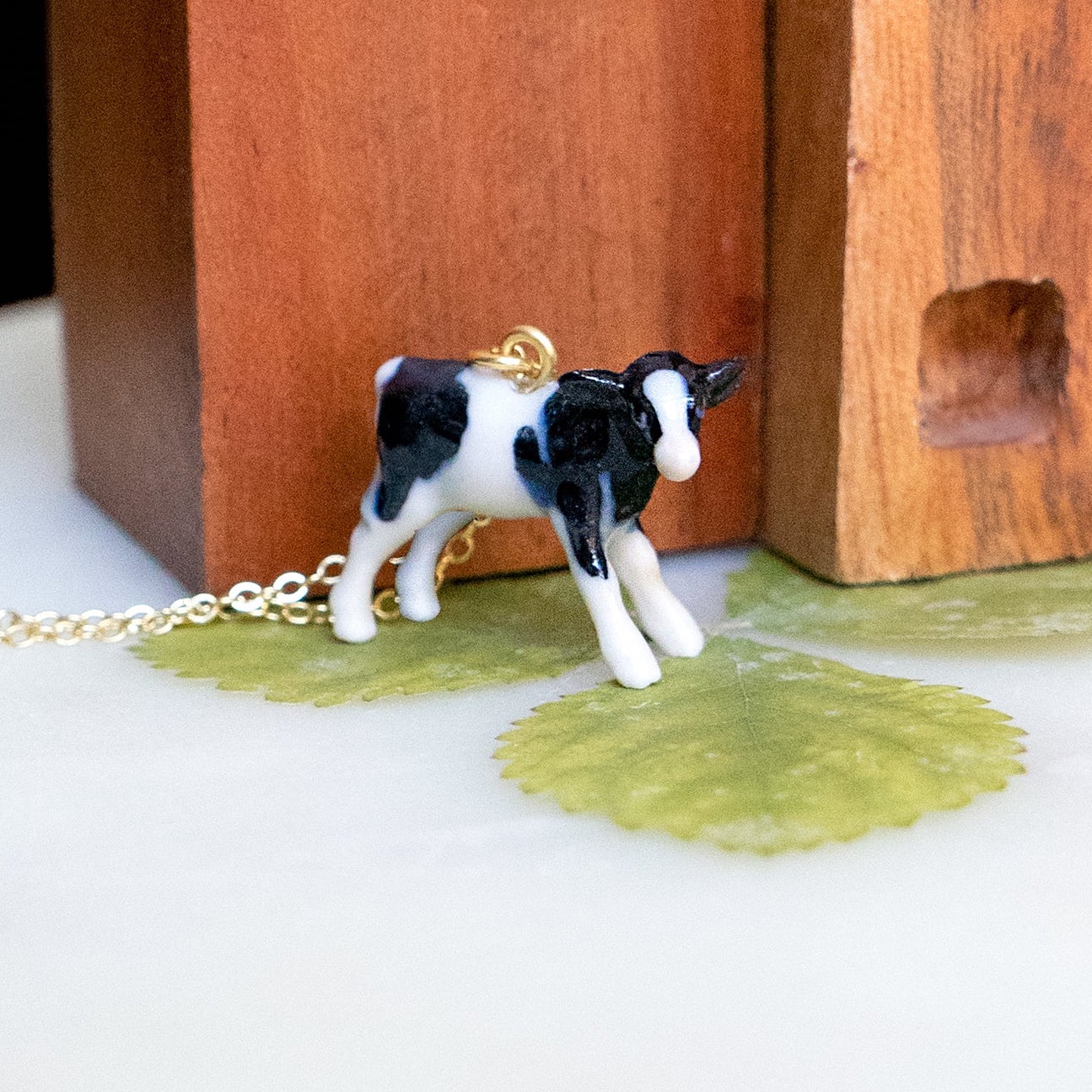 Peter + June - Necklace - Hand-Painted Porcelain Pendant (Spotted Cow)