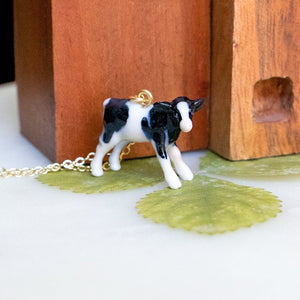 Peter + June - Necklace - Hand-Painted Porcelain Pendant (Spotted Cow)